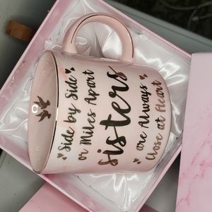Sisters close at heart mug